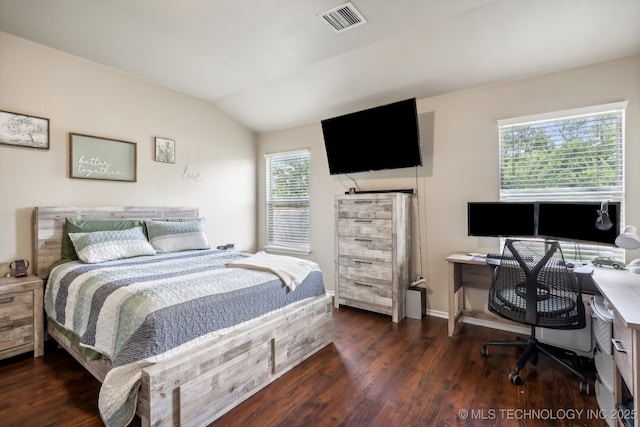 bedroom featuring dark hardwood / wood-style floors and vaulted ceiling