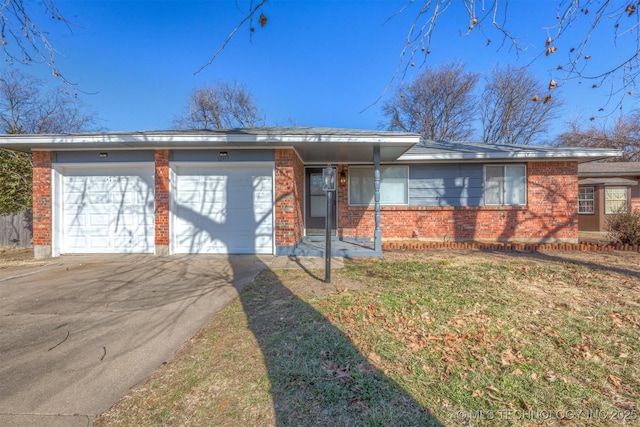 ranch-style house with a garage and a front yard