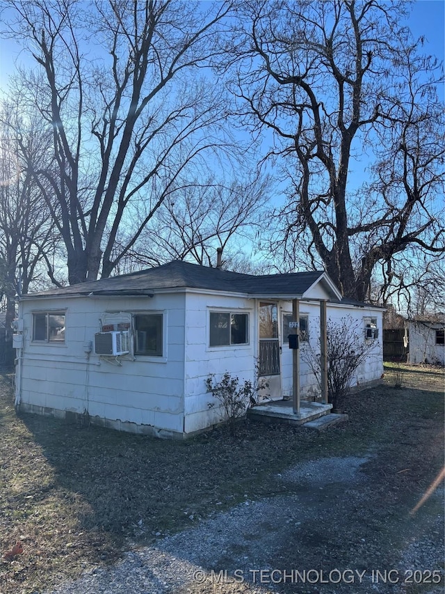 view of front of property featuring cooling unit