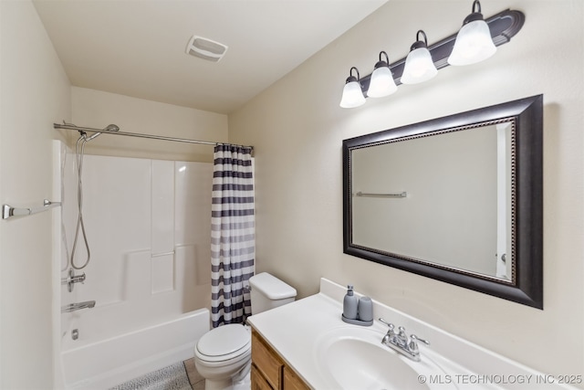 full bathroom featuring vanity, shower / bath combination with curtain, and toilet