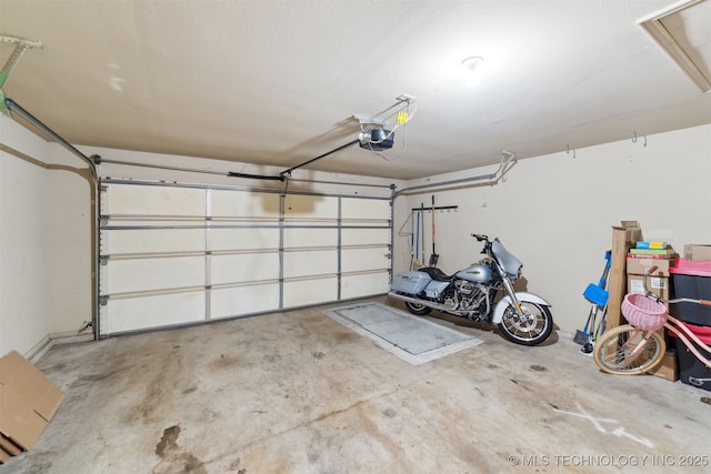 garage featuring a garage door opener