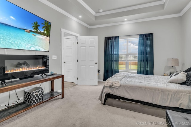 bedroom with light carpet, crown molding, and a raised ceiling