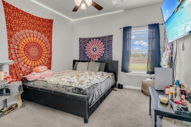 bedroom featuring ceiling fan and carpet floors