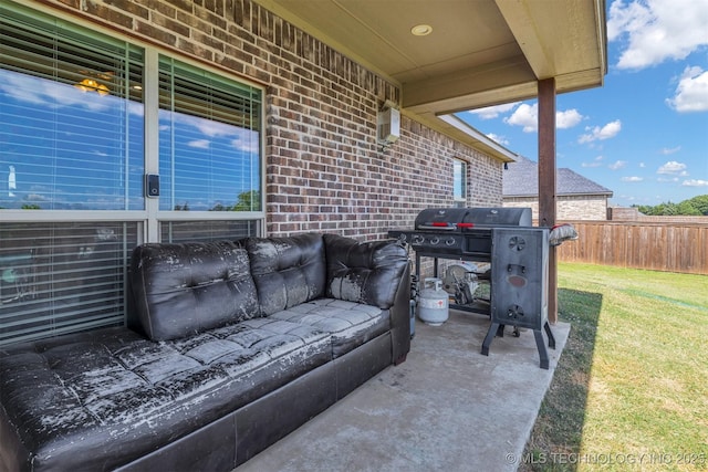 view of patio / terrace with an outdoor living space and a grill