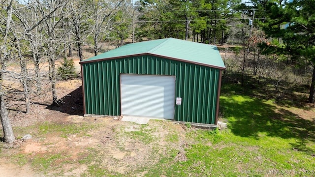 view of outdoor structure featuring a garage