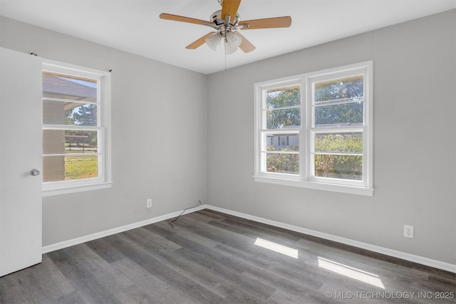 unfurnished room with ceiling fan, a healthy amount of sunlight, and dark hardwood / wood-style floors