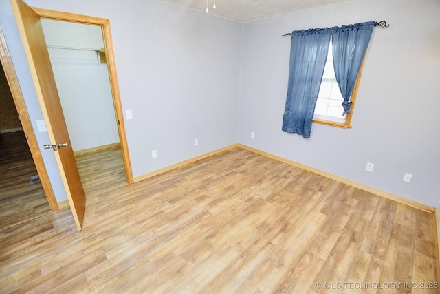 empty room featuring light hardwood / wood-style flooring