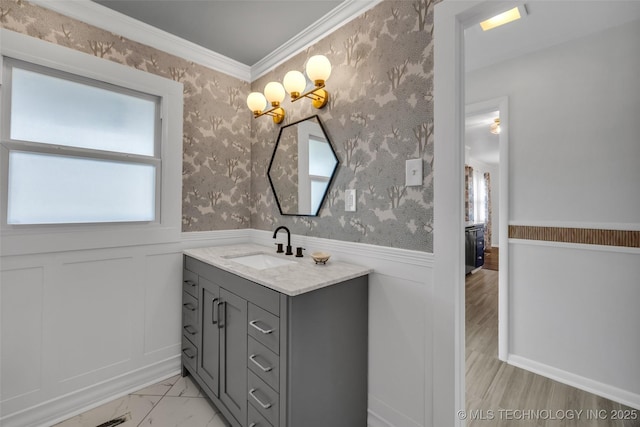 bathroom featuring vanity and crown molding