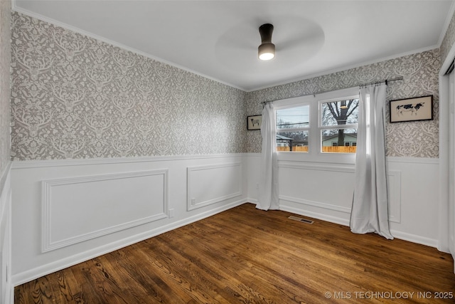 unfurnished room featuring hardwood / wood-style floors and ceiling fan