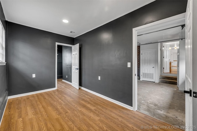 unfurnished bedroom featuring light hardwood / wood-style flooring