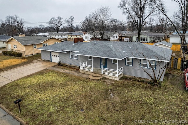 ranch-style home with a garage, a porch, and a front yard