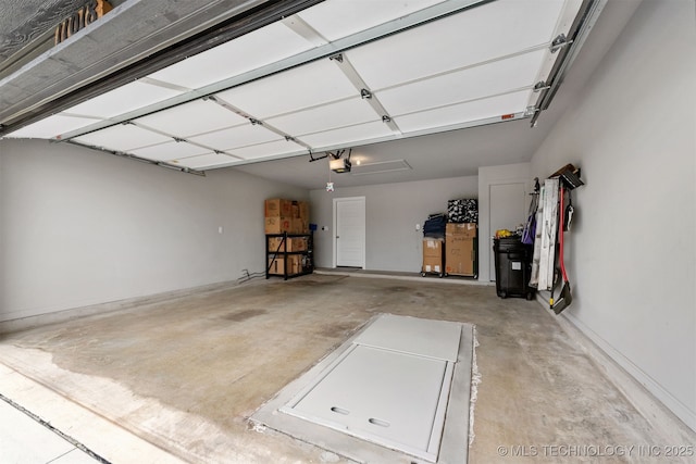 garage featuring a garage door opener