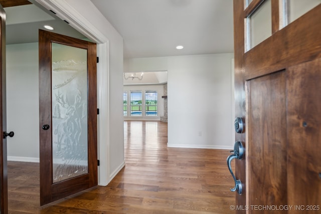 foyer with hardwood / wood-style flooring