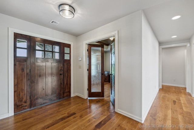 foyer featuring wood-type flooring