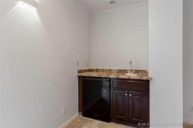 bar featuring sink, light carpet, dark brown cabinets, fridge, and ornamental molding