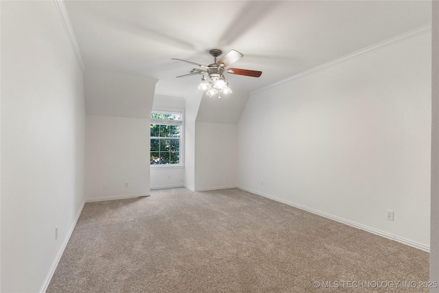 additional living space with ceiling fan, vaulted ceiling, and light carpet