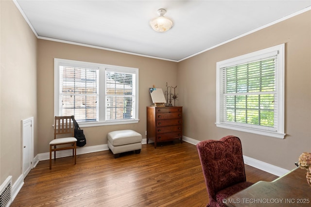 living area with a wealth of natural light, dark wood-type flooring, and ornamental molding