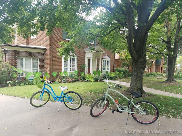 view of front of home with a front yard