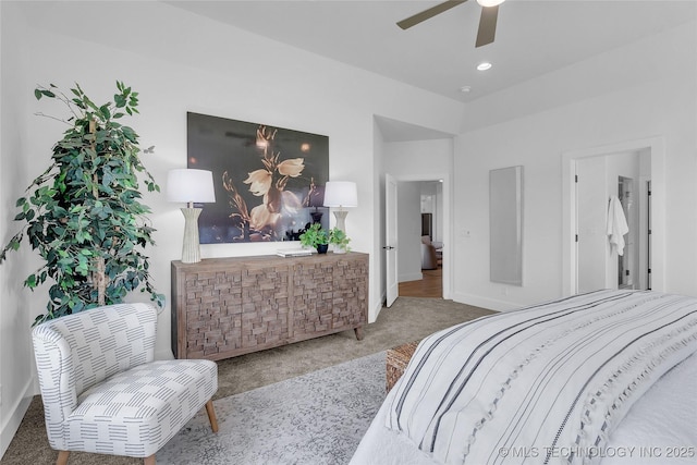 carpeted bedroom with ceiling fan