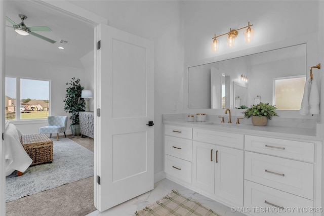 bathroom featuring vanity and ceiling fan