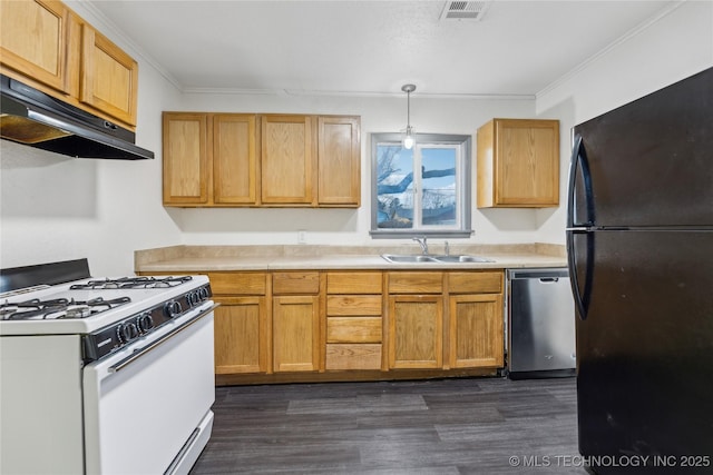 kitchen featuring sink, black fridge, stainless steel dishwasher, white gas range, and pendant lighting