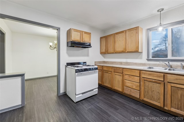 kitchen with sink, white range with gas stovetop, dark hardwood / wood-style flooring, and decorative light fixtures