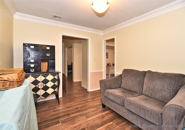 living room featuring crown molding