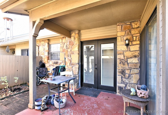 property entrance featuring french doors