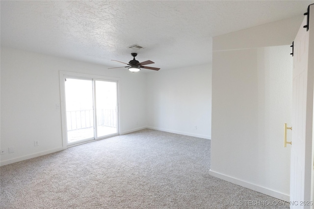 7850 S Park Ave, Broken Arrow, OK 74011 - spare room featuring carpet floors, a ceiling fan, baseboards, and a textured ceiling