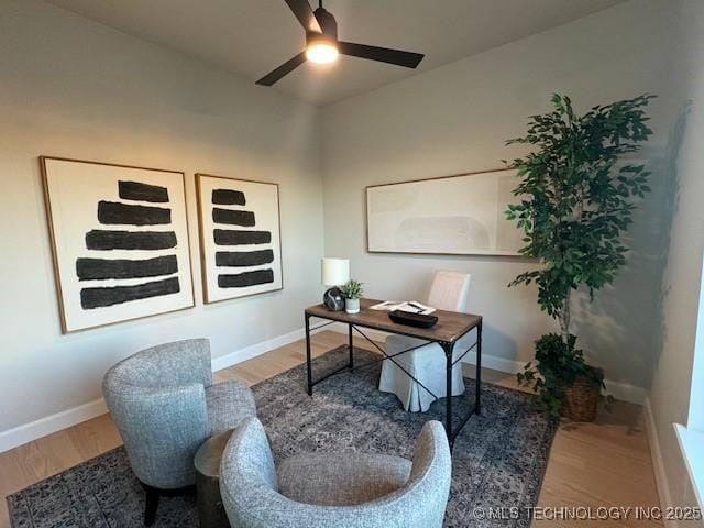 office area with hardwood / wood-style floors and ceiling fan