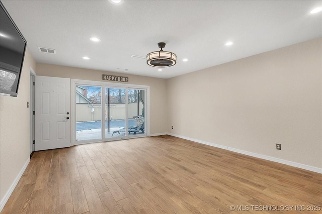 empty room with light wood-type flooring