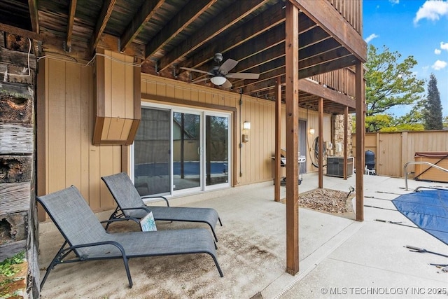 view of patio featuring ceiling fan