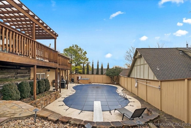 view of swimming pool with a patio and a pergola