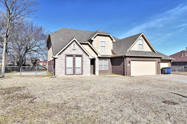 view of front of house with a garage and a front yard