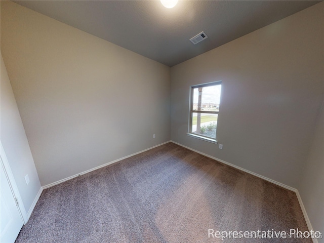 empty room with carpet floors