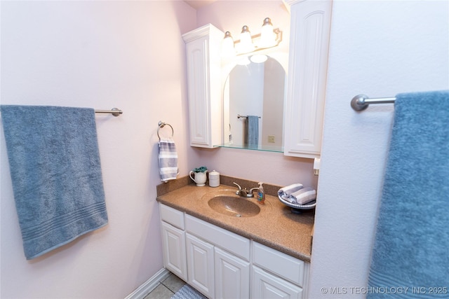 bathroom featuring tile patterned floors and vanity