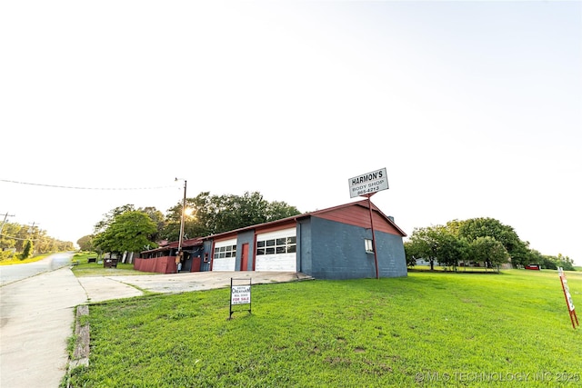 view of property exterior with a yard