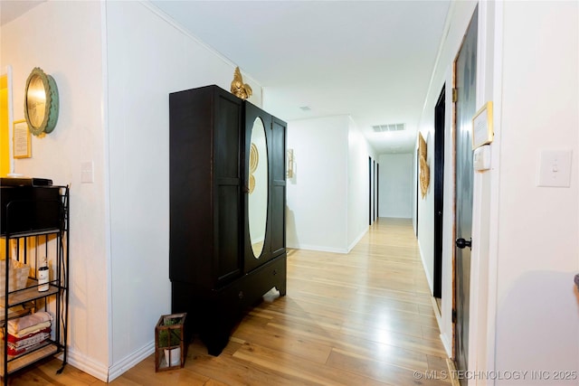 hall featuring light wood-type flooring