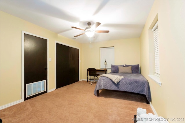 carpeted bedroom featuring ceiling fan