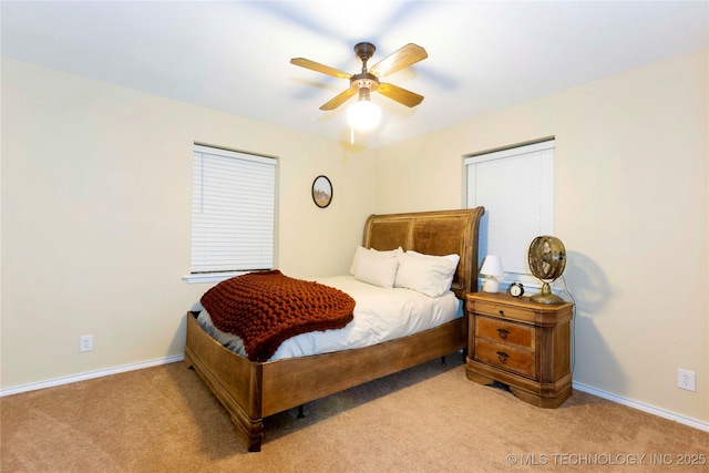 bedroom with light colored carpet and ceiling fan