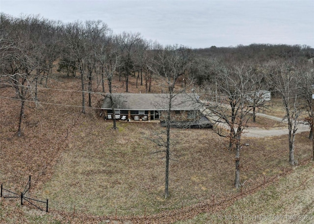 view of front of property with a rural view