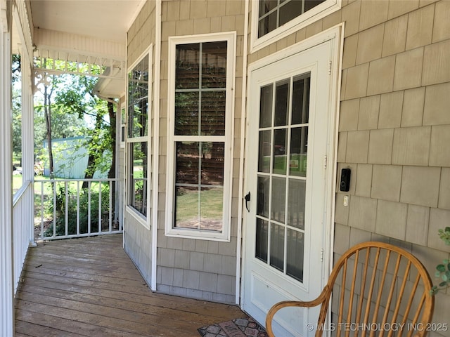 doorway to property featuring a porch