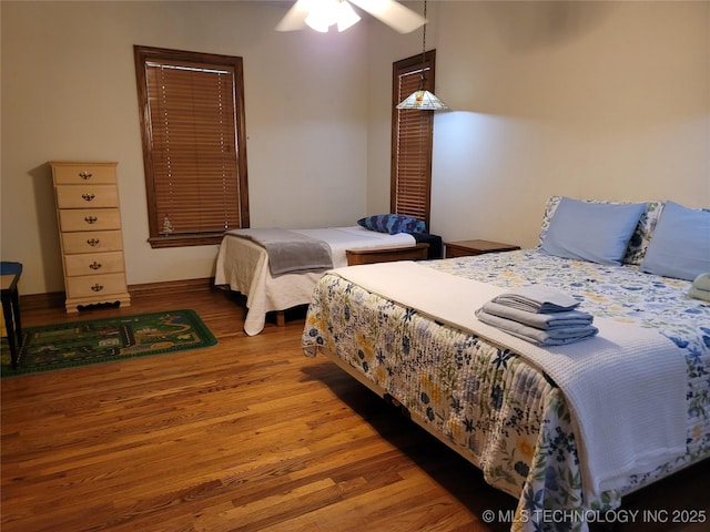 bedroom with wood-type flooring