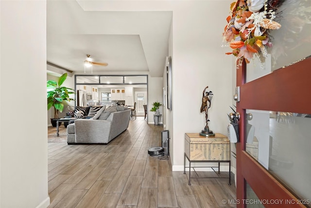 living room with ceiling fan