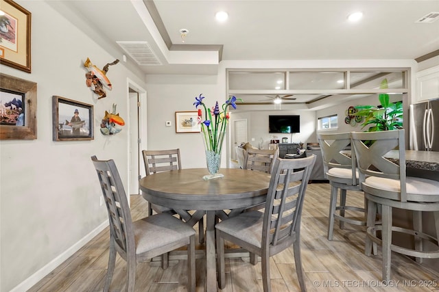 dining area with ceiling fan