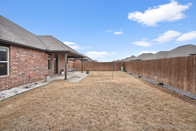 view of yard with a patio area