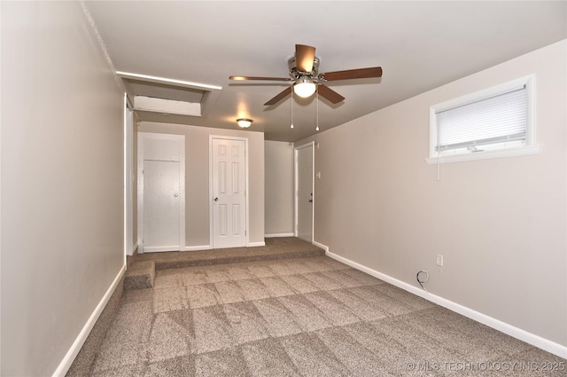 unfurnished bedroom with carpet floors and ceiling fan