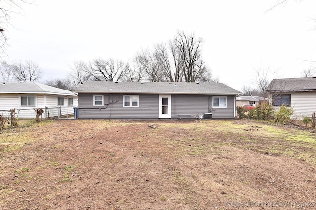 back of property featuring cooling unit