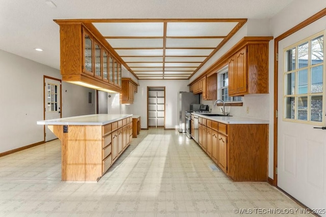 kitchen with sink and a breakfast bar area