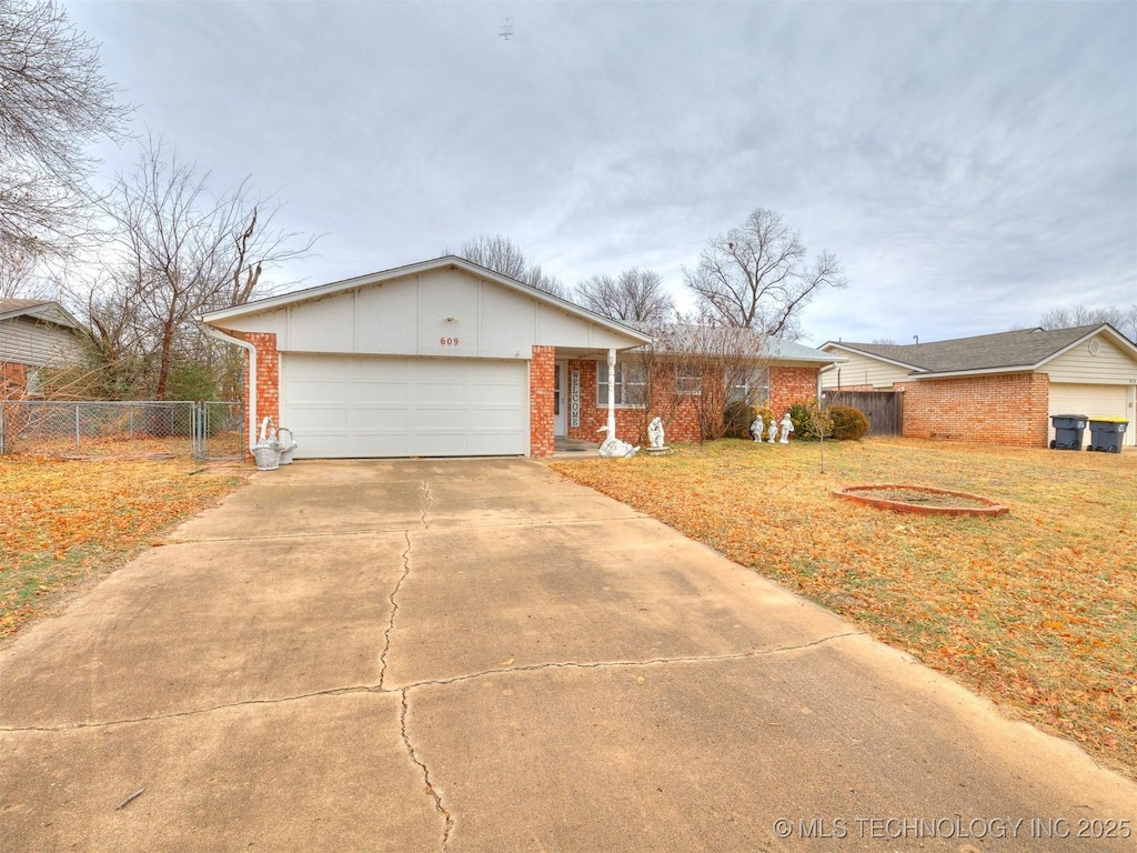 single story home with a garage